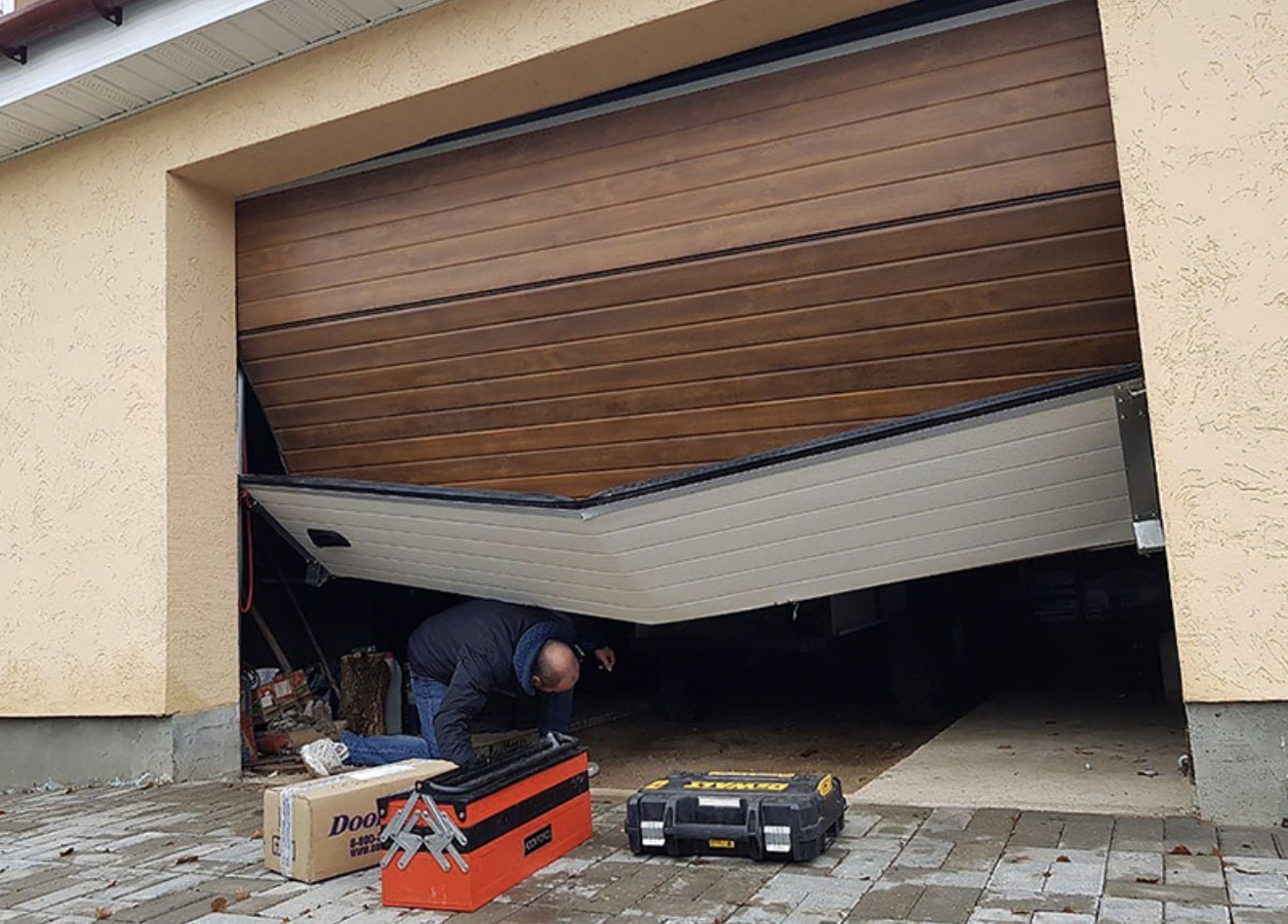 Garage door repair Dnipro — before